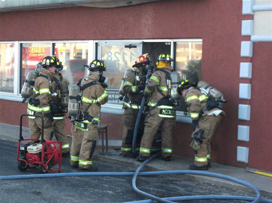 Firefighters Enter the Subway on South Washington Street