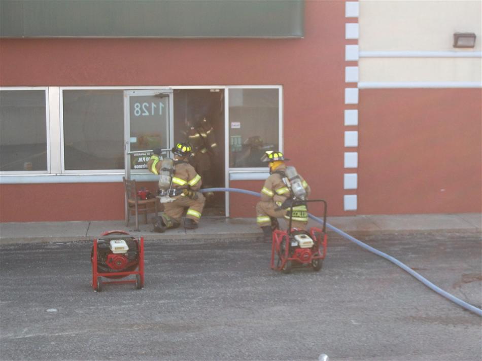 Firefighters Work to Extinguish Subway Fire